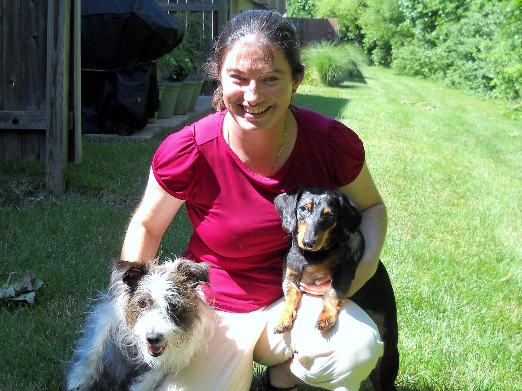 Lori Konomos with dogs Tucker and Fritz